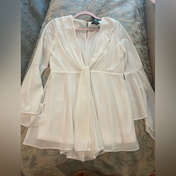 White Romper with Bell Sleeves, a Deep V Cut, and tie detailing - Picture 3 of 8